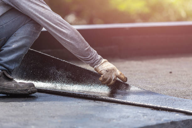Professional Waterproofing technician working in Carleton, MI